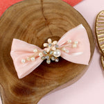 Fabric bow charm hair clip, laid flat