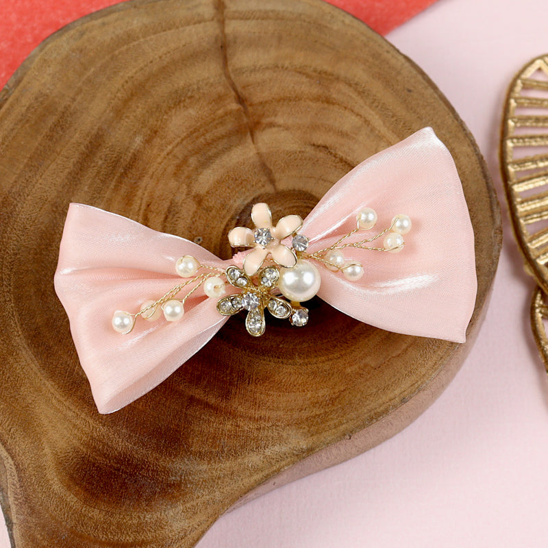 Fabric bow charm hair clip, laid flat