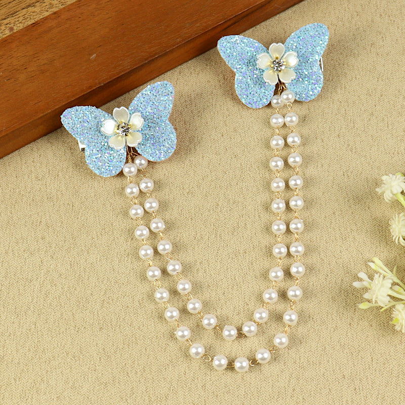 Blue Butterfly Glitter Hair Clip, laid flat