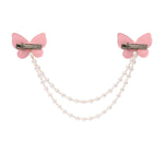 Close-up of the glitter finish on the butterfly on the pink clip