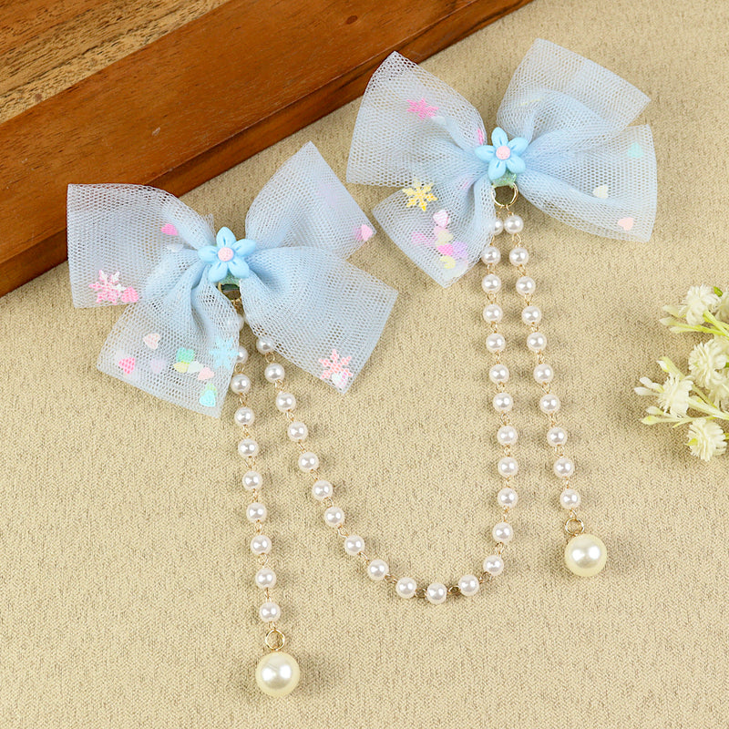 Blue Bow Tassels Hair Clip, laid flat