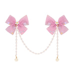 Pink Bow Tassels Hair Clip worn in hair, showing the tassel drop
