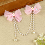Pink Bow Tassels Hair Clip, laid flat