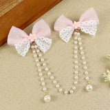Pink Bow Tassels Hair Clip, laid flat
