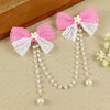 Pink Bow Tassels Hair Clip, laid flat