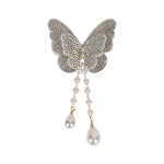 Silver Butterfly Beaded Tassel Hair Clip worn in hair, showing the beaded butterfly and its tassel drop
