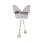 Close-up of the beaded butterfly and its tassel drop on the silver clip