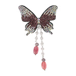 Purple Butterfly Beaded Tassel Hair Clip worn in hair, showing the beaded butterfly and its tassel drop