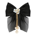 Black Bow Tassels Hair Clip worn in hair, showing the tassel drop