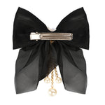 Close-up of the tassel drop on the black clip