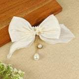 White Bow Tassels Hair Clip, laid flat