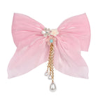 Pink Bow Tassels Hair Clip worn in hair, showing the tassel drop