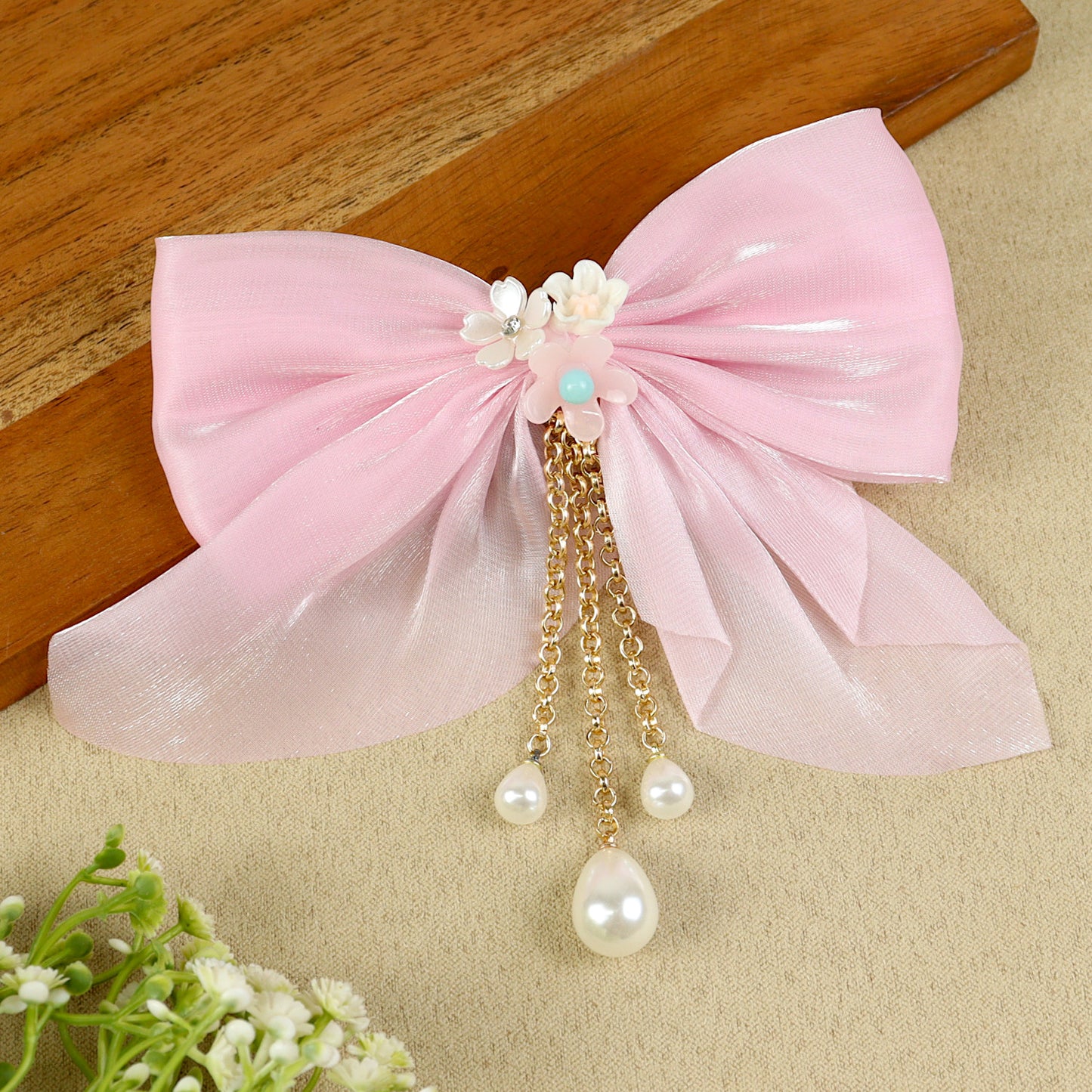 Pink Bow Tassels Hair Clip, laid flat