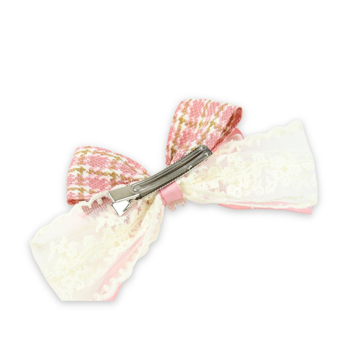 Close-up of the floral charm on the bow on the pink clip