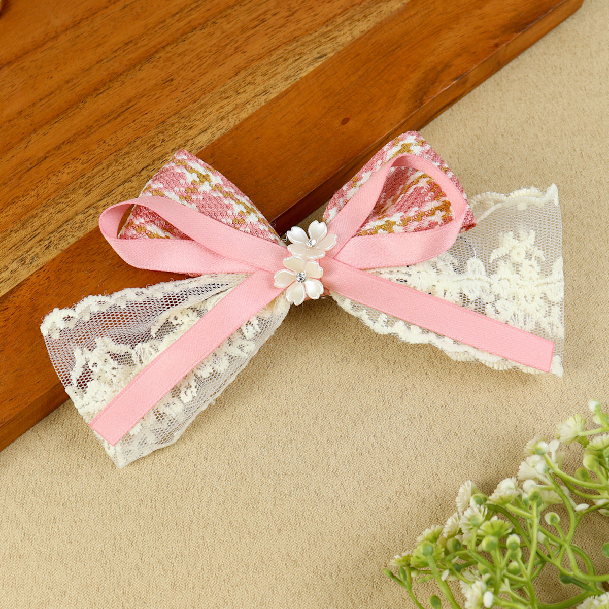 Pink Floral Charm Bow Hair Clip, laid flat