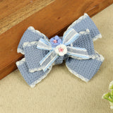 Blue Floral Charm Bow Hair Clip, laid flat
