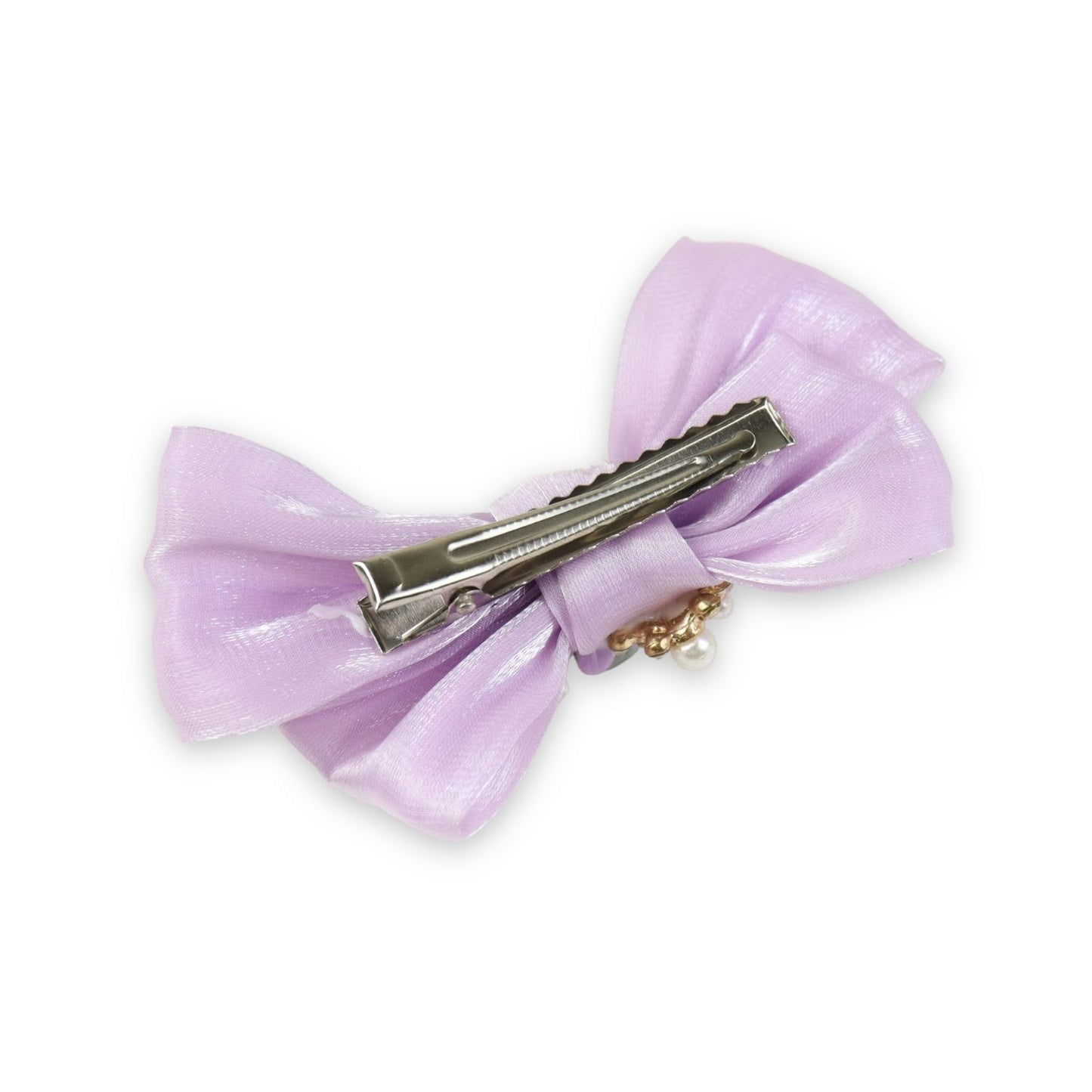 Close-up of the floral charm on the bow on the purple clip