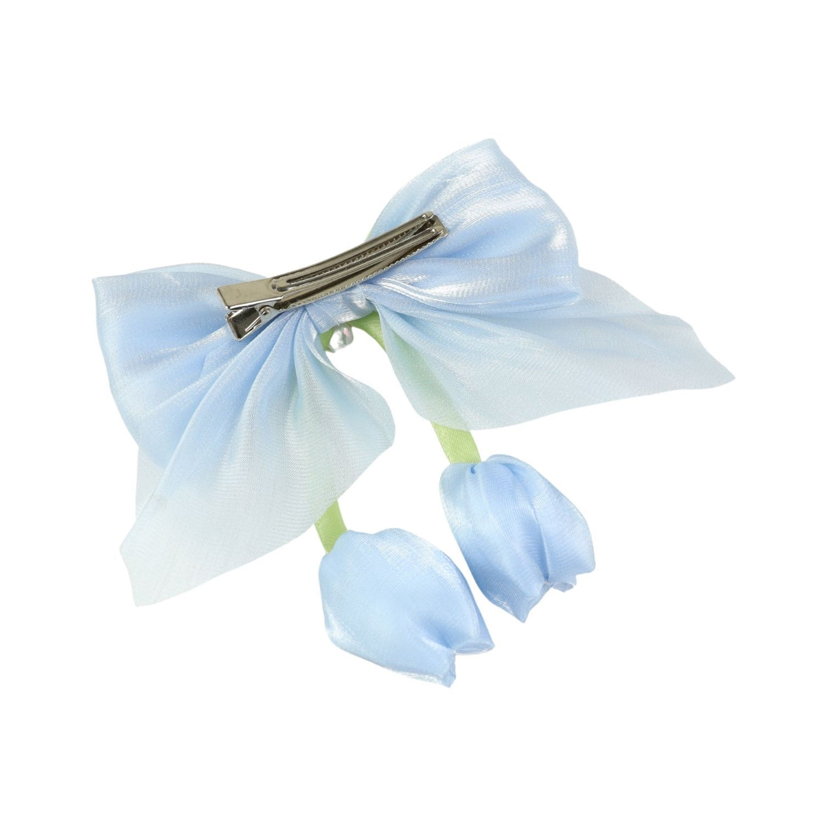 Close-up of the floral charm on the bow on the blue clip