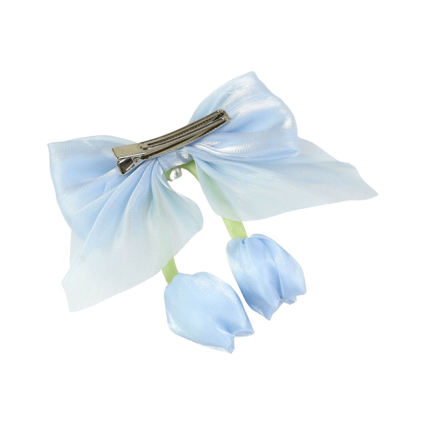 Close-up of the floral charm on the bow on the blue clip