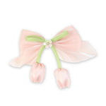Pink Floral Charm Bow Hair Clip worn in hair, showing the floral charm on the bow