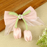 Pink Floral Charm Bow Hair Clip, laid flat