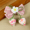 Pink Bow Tassels Hair Clip, laid flat