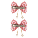Close-up of the tassel drop on the pink clip