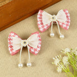 Set of 2 Pink Bow Tassels Hair Clips, laid flat