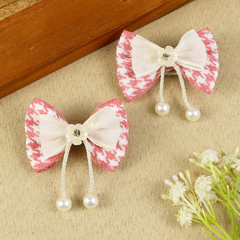 Set of 2 Pink Bow Tassels Hair Clips, laid flat