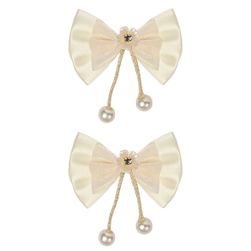 White Bow Tassels Hair Clips worn in hair, showing the tassel drop