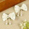 Set of 2 White Bow Tassels Hair Clips, laid flat