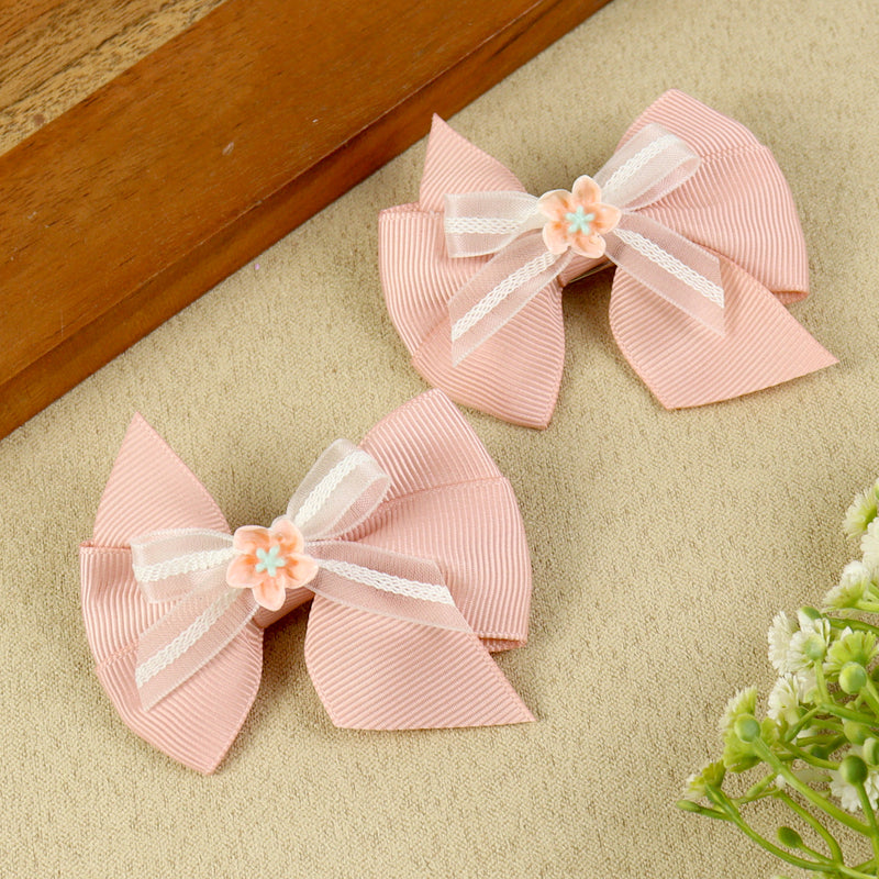 Set of 2 Pink Bow Hair Clips, laid flat