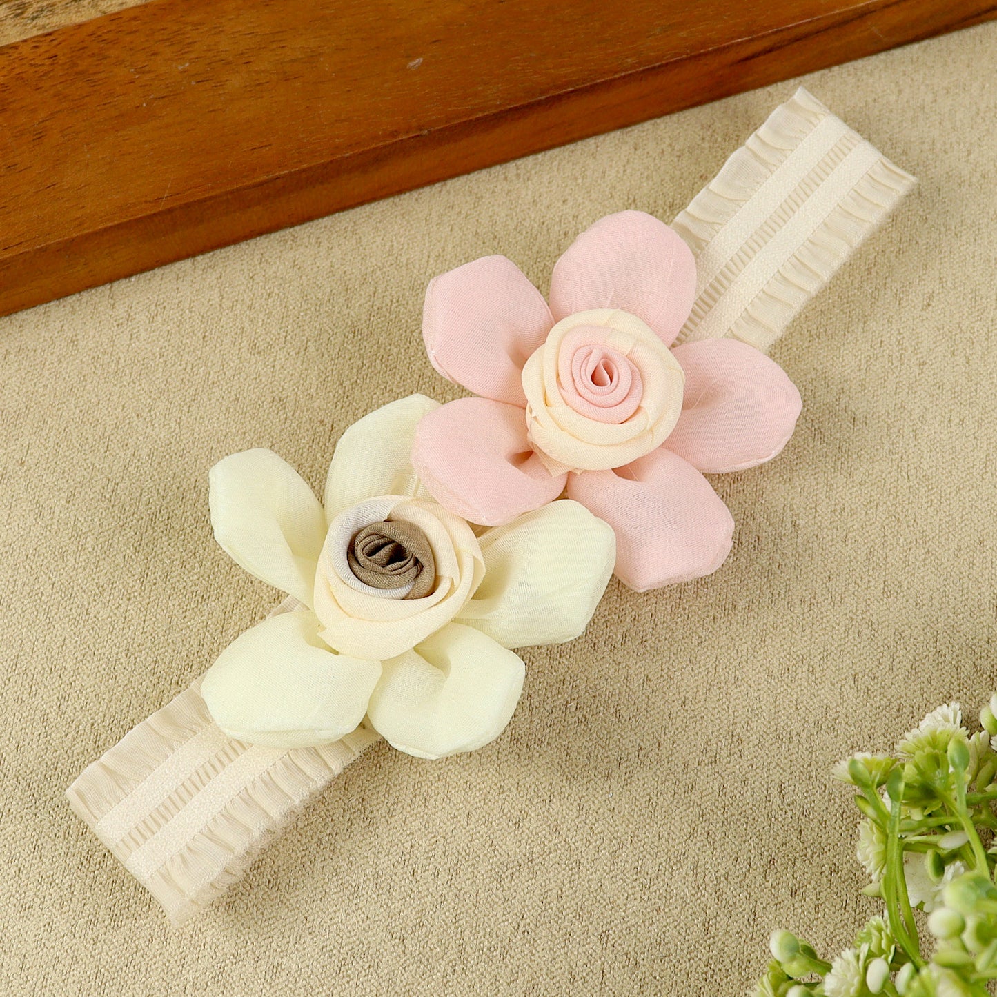 soft, stretchable elastic headband featuring pastel flowers.