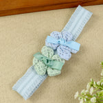 soft, stretchable elastic headband featuring pastel flowers.
