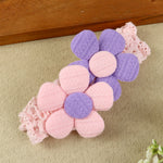 soft, stretchable elastic headband featuring pastel flowers.