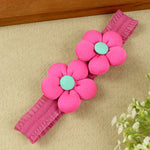 soft, stretchable elastic headband featuring pastel flowers.