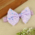 soft, stretchable elastic headband featuring pastel flowers.