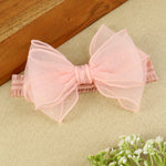 soft, stretchable elastic headband featuring pastel flowers.