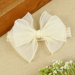soft, stretchable elastic headband featuring pastel flowers.