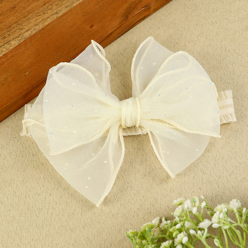 soft, stretchable elastic headband featuring pastel flowers.