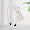 Soft, stretchable, and comfortable free-size hair band designed for young girls.