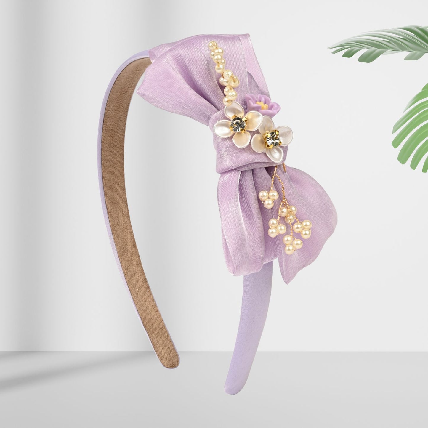 Soft, stretchable, and comfortable free-size hair band designed for young girls.