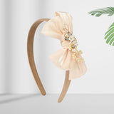 Soft, stretchable, and comfortable free-size hair band designed for young girls.