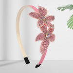 Soft, stretchable, and comfortable free-size hair band designed for young girls.