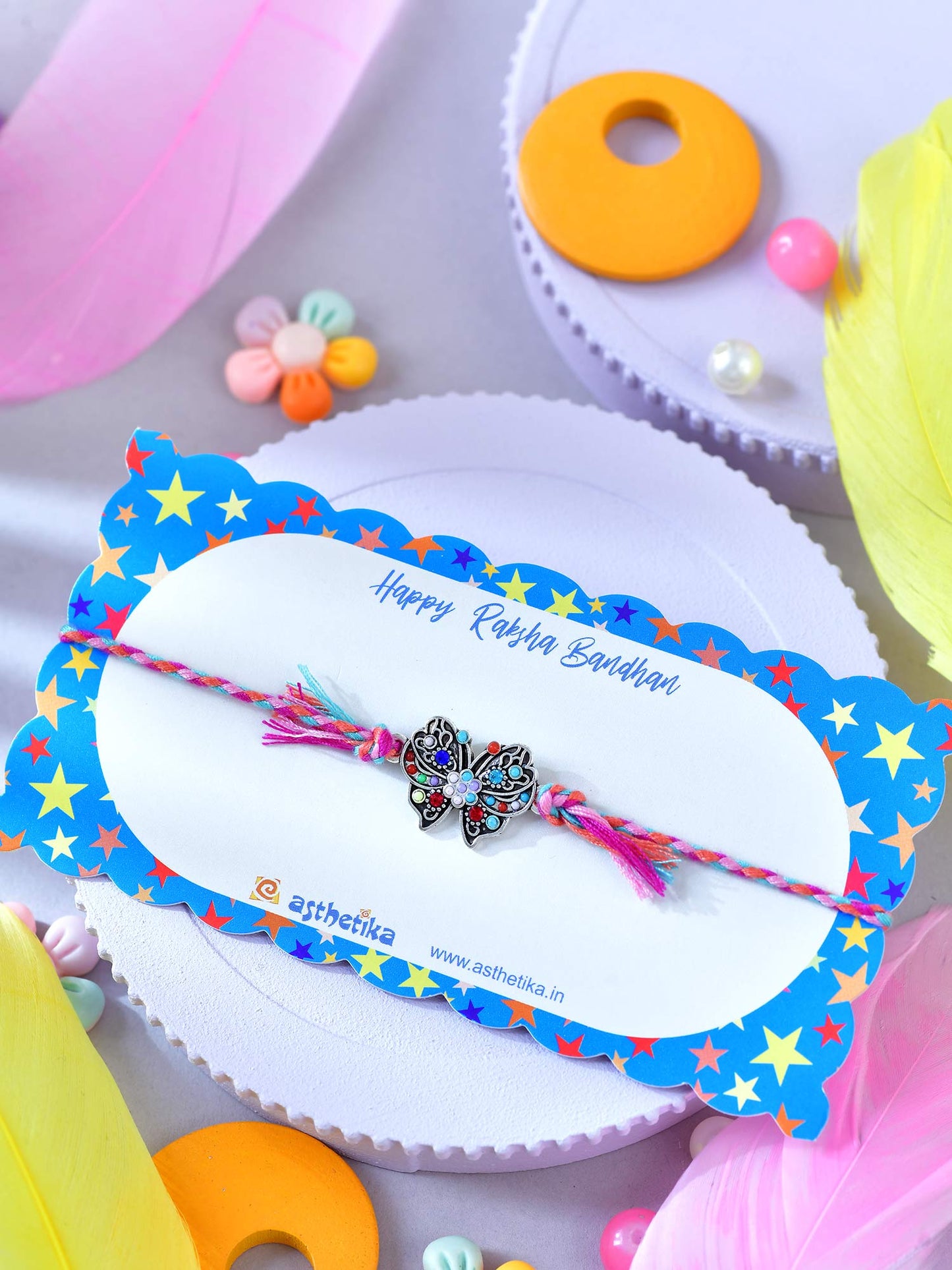Asthetika butterfly bracelet Rakhi in packaging