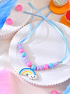 Rainbow beaded kids Rakhi in multicolour plastic beads