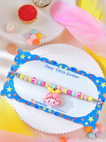 Asthetika doll charm beaded Rakhi in packaging