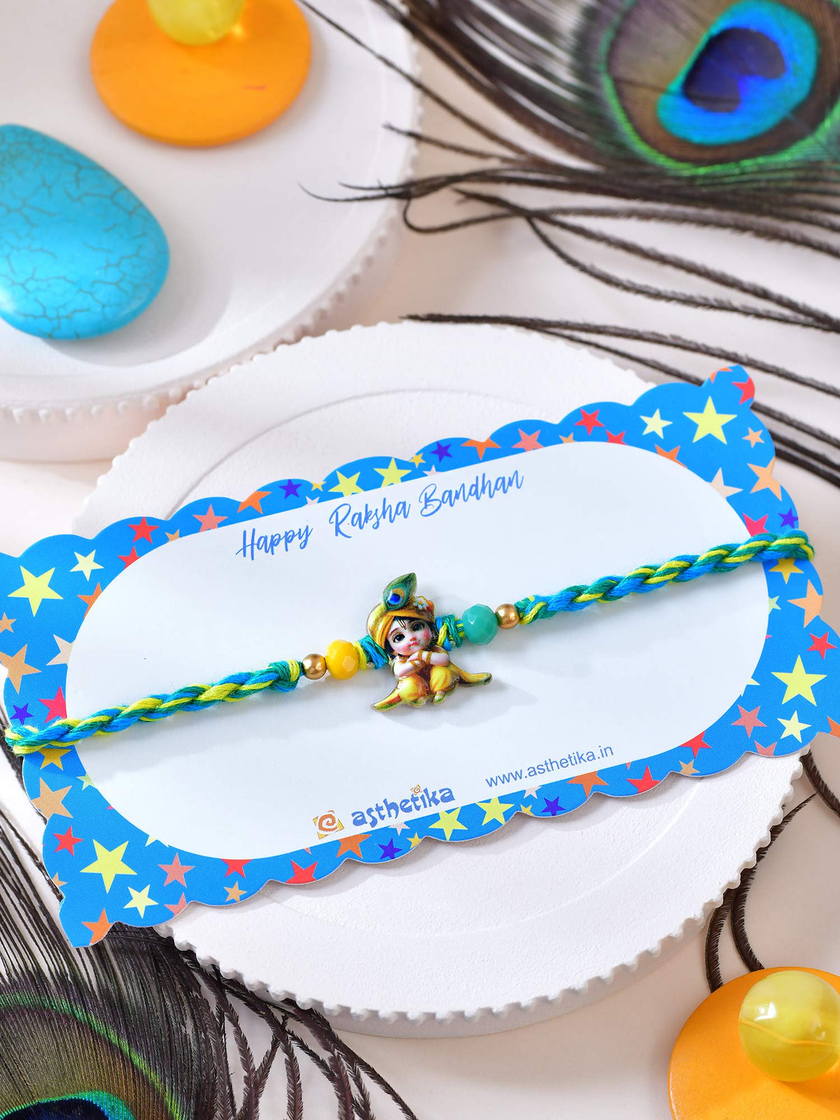 Asthetika Krishna Rakhi in gift packaging