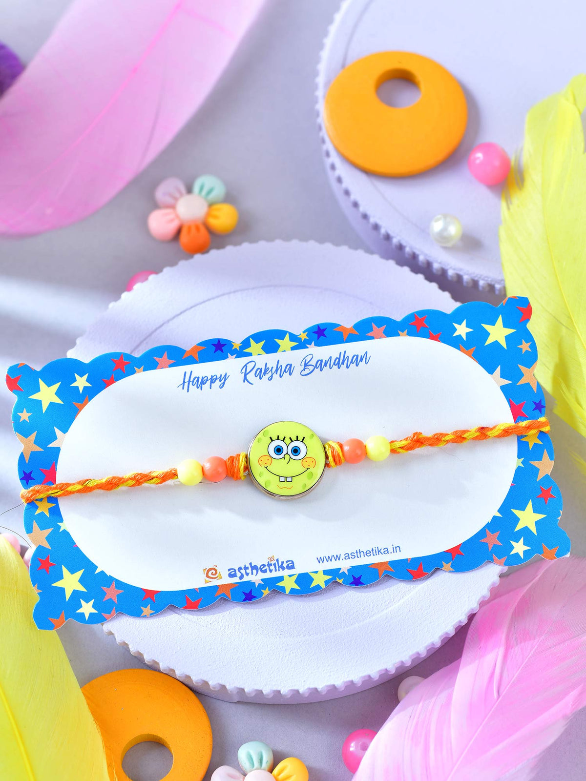 Asthetika smiley kids Rakhi in packaging