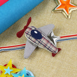 Airplane kids Rakhi, laid flat